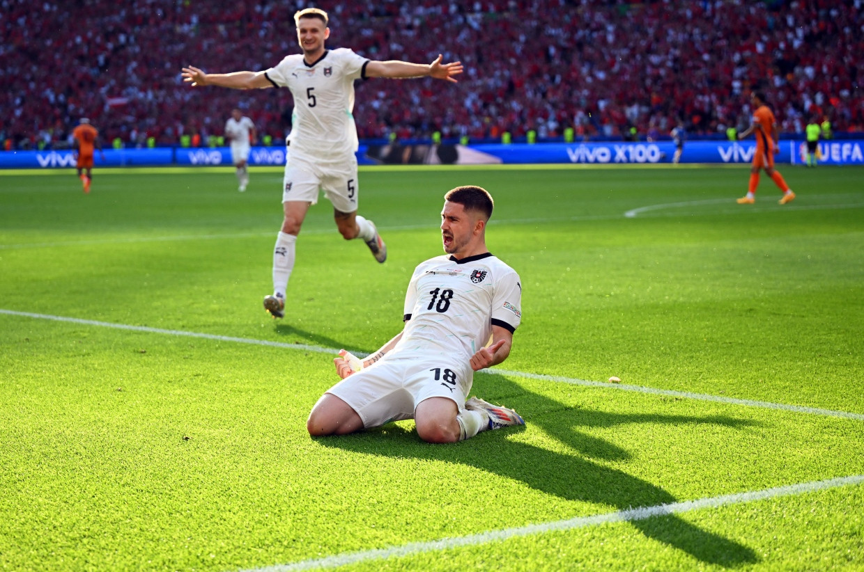 Austria's Romano Schmid celebrates his goal to make it 2-1 against the Netherlands.