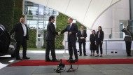 Chancellor Olaf Scholz welcomes Argentine President Javier Milei at the Chancellery in Berlin.