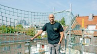 The safety net is for the roofers: As a scaffolder, Daniel Wolf works with many other trades.