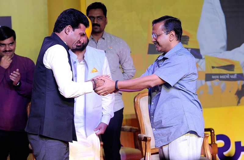 Isudan Gadhvi with Arvind Kejriwal after being elected as a AAP member