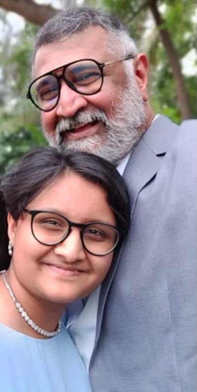 Adithya Menon with his daughter