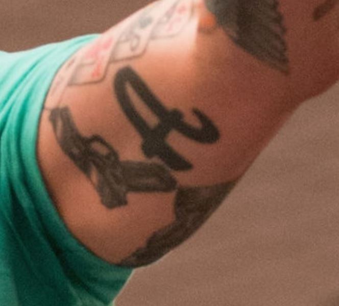 Jason David Frank's tattoo on inner left bicep