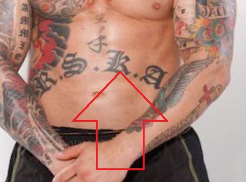 Jason David Frank's tattoo on abdomen