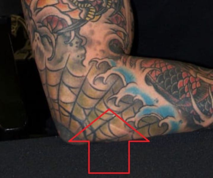 Jason David Frank's tattoo on right elbow