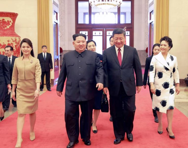 From left to right Ri Sol-ju, Kim Jong-un, Xi Jinping, and Peng Liyuan