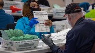 Poll workers sort ballots in Arizona