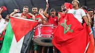 Explosive material: Moroccan fans with the Palestine flag